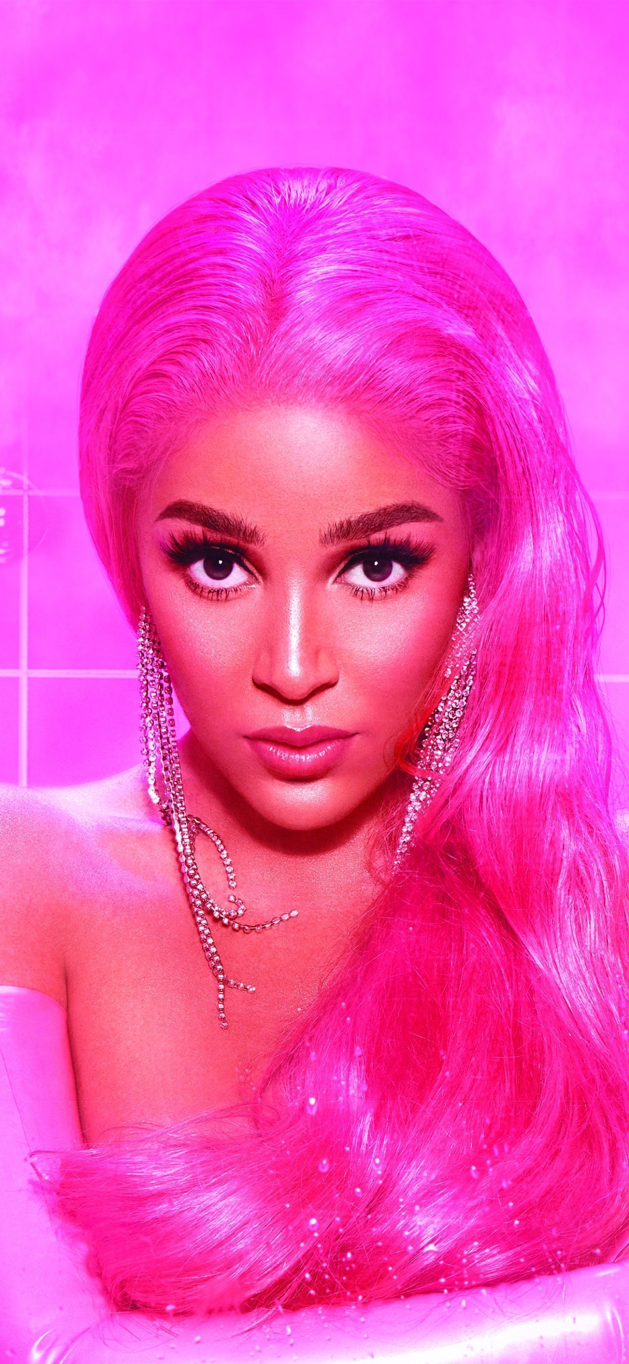 A woman with pink hair and big earrings - Doja Cat, pink
