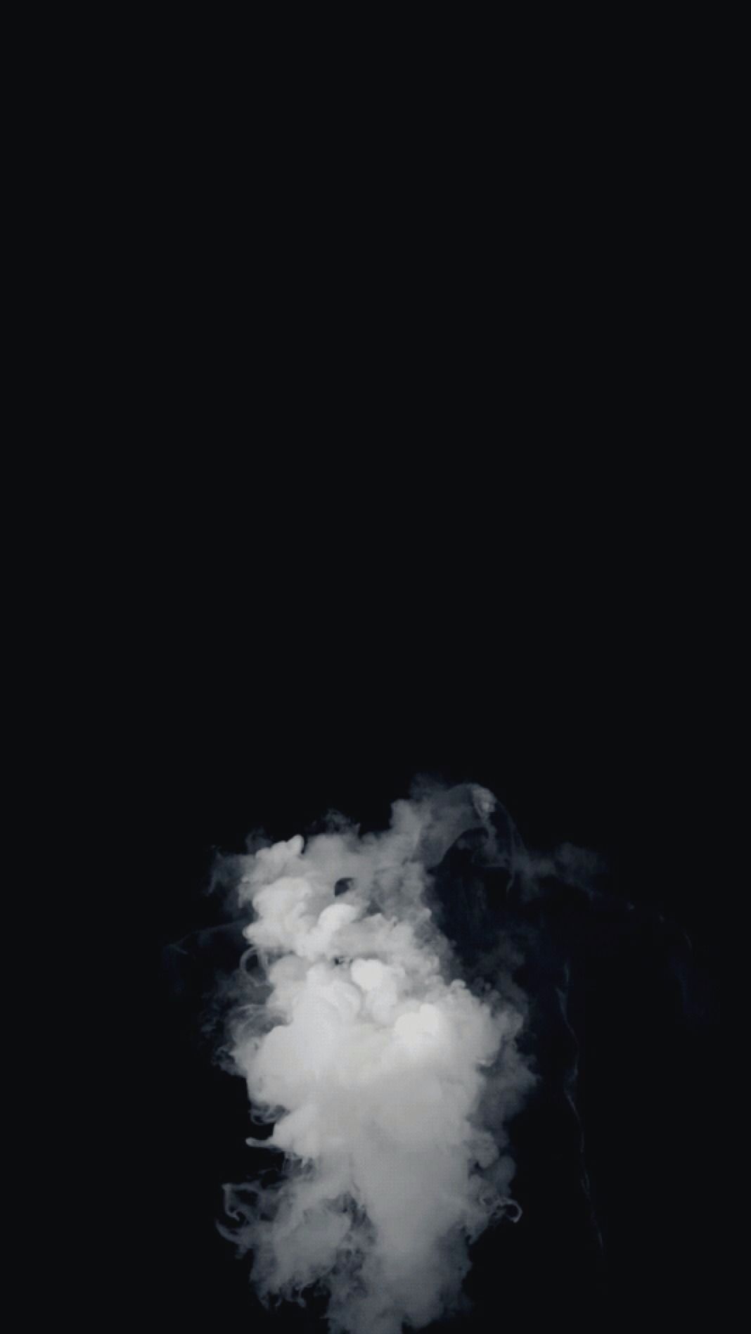 A dark background with a cloud of smoke in the center - Dark, black phone, iPhone, dark phone, black