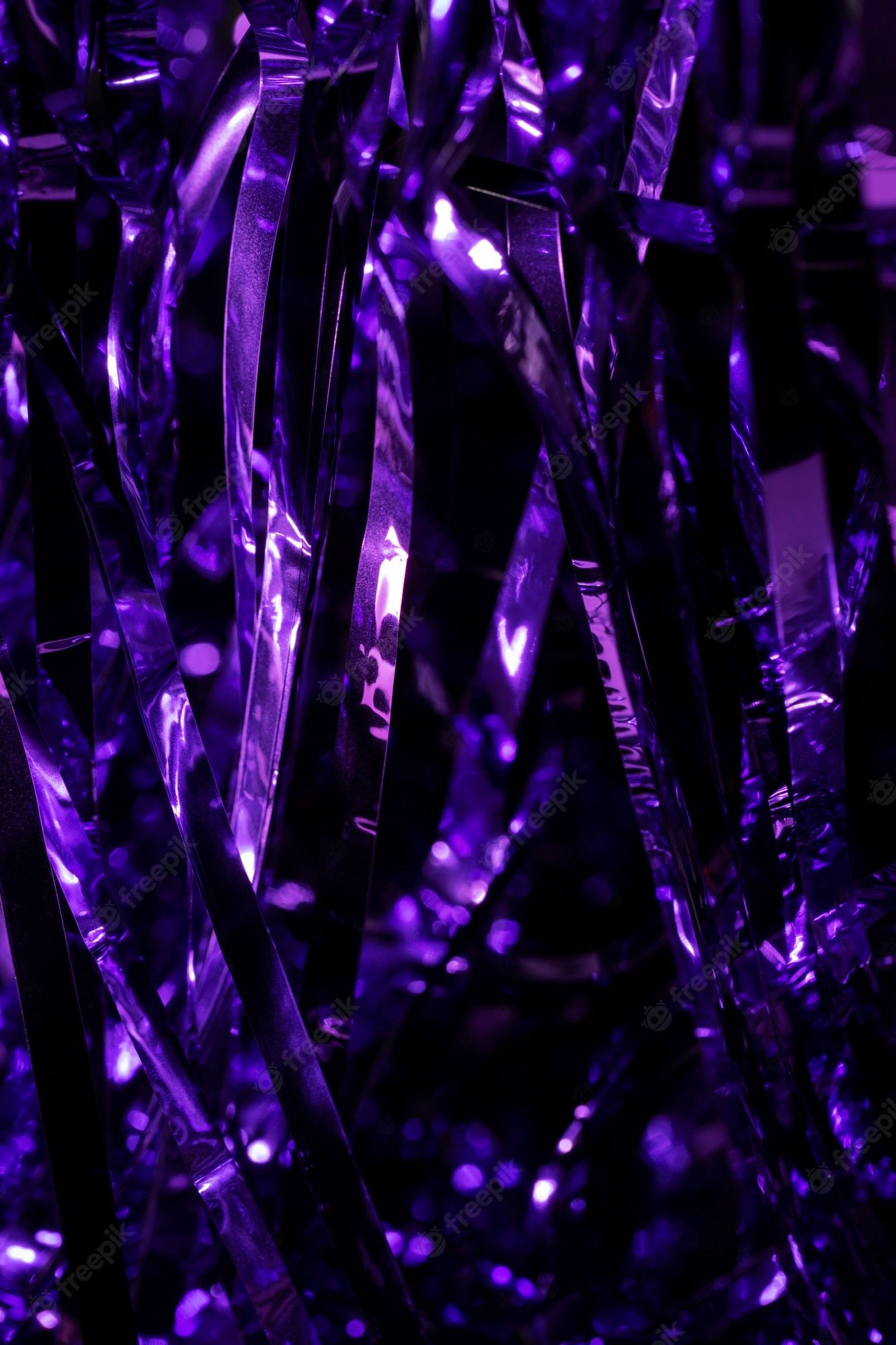 Free Photo. Close up on sparkling purple fabric