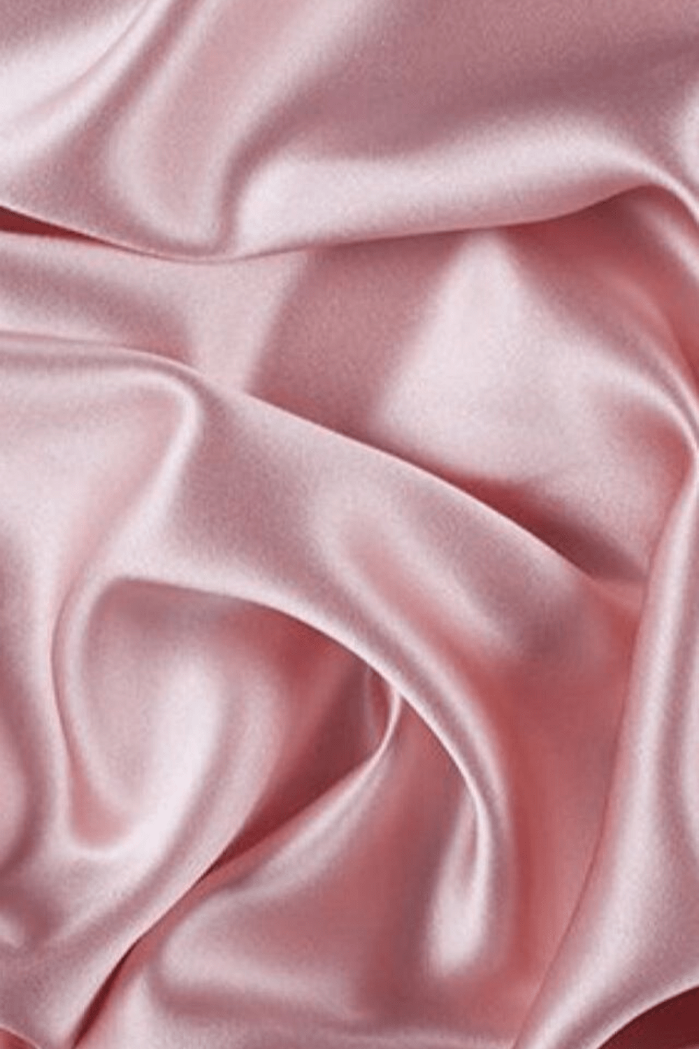 A close up of a pink silk fabric - Silk, pink