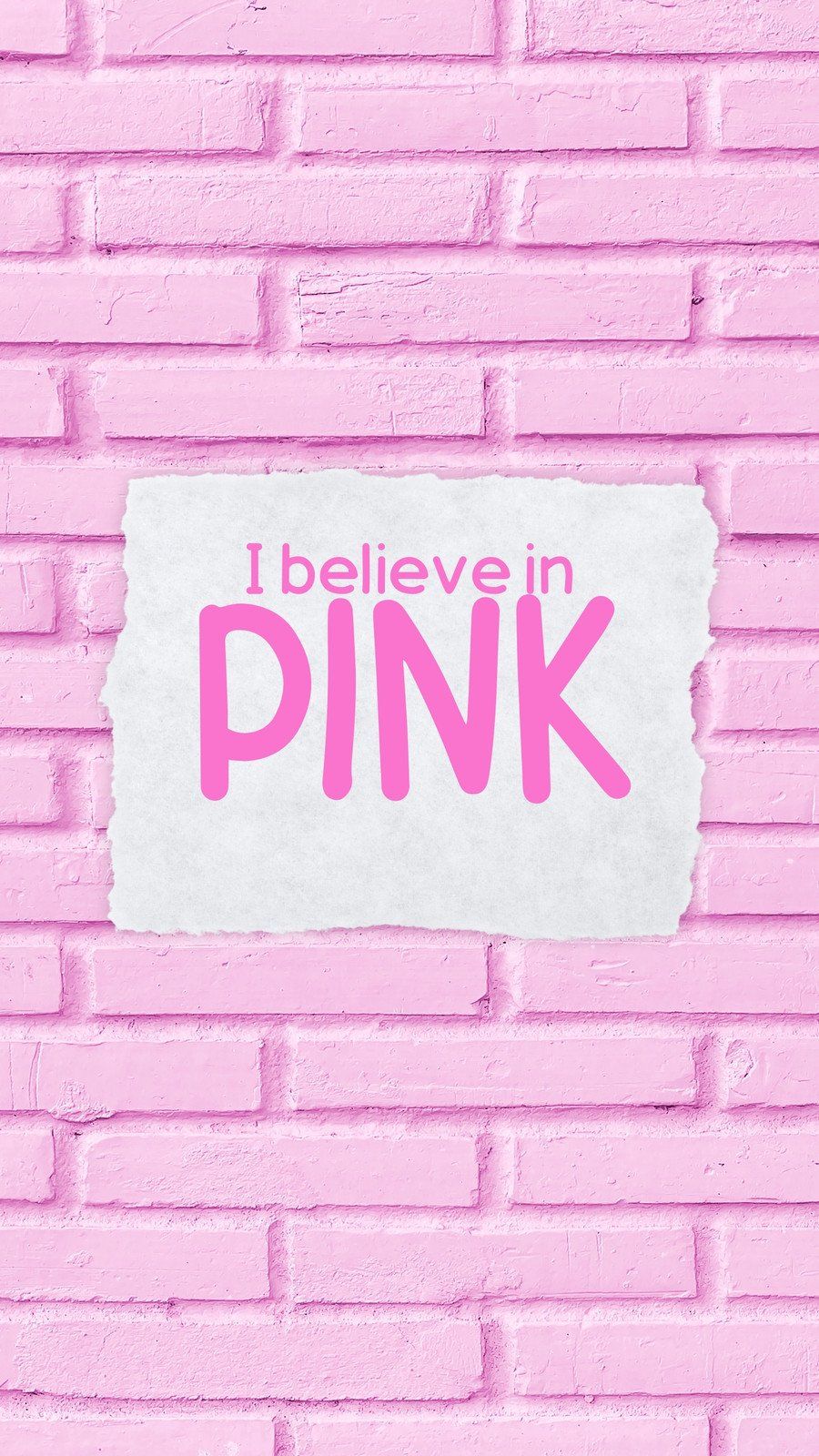 IPhone wallpaper with a pink brick wall and the words 
