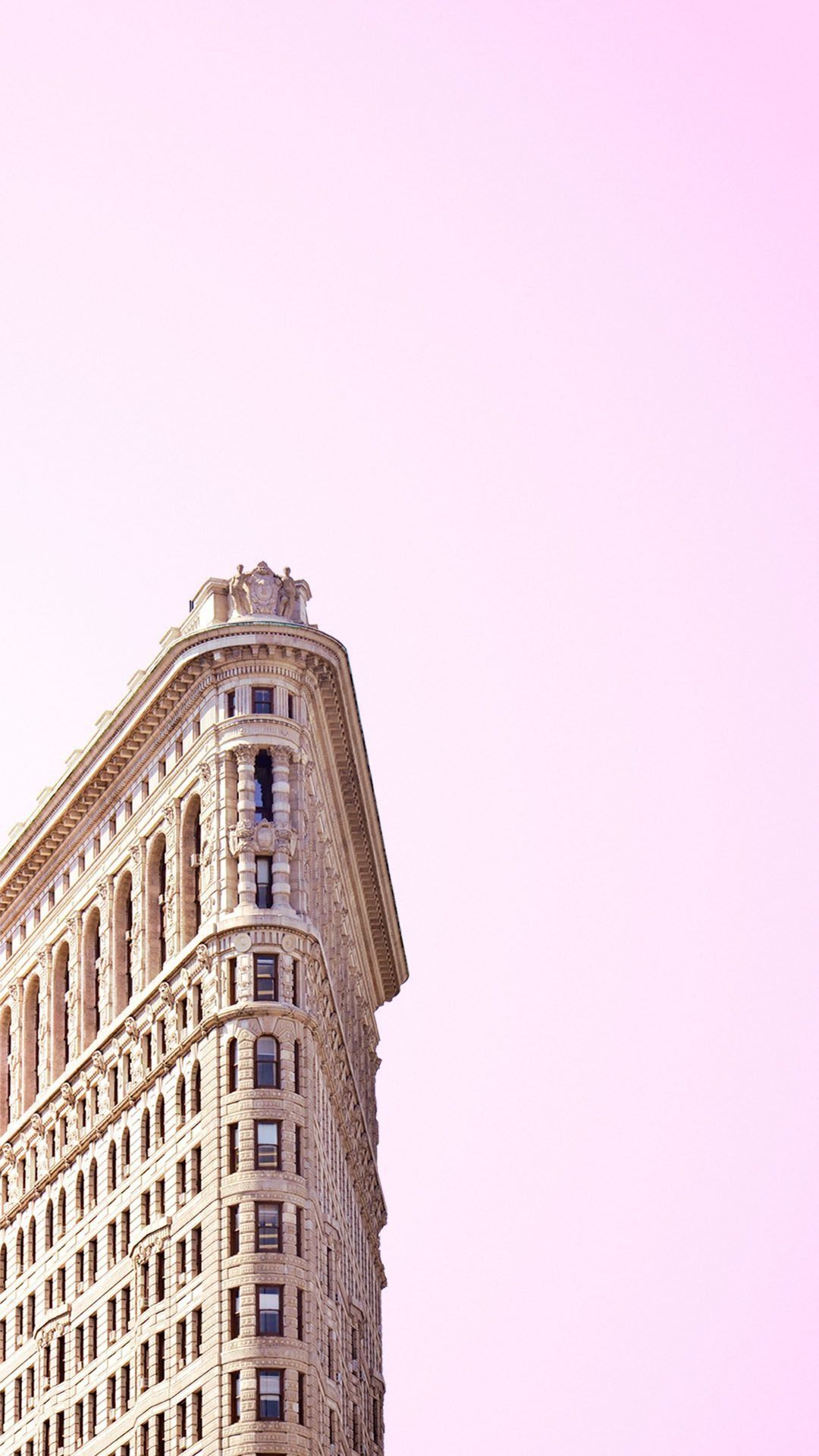 IPhone wallpaper of the top of the Flatiron Building in New York City - New York, pink