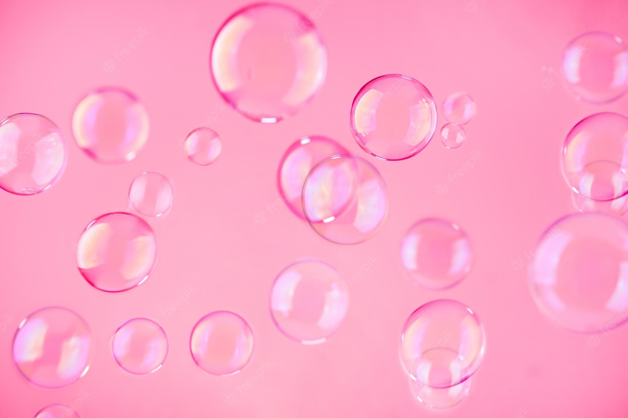 Premium Photo. Abstract beautiful viva magenta soap bubbles background pink soap bubbles wallpaper
